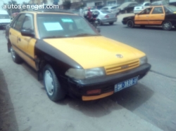 TAXI TOYOTA CARINA